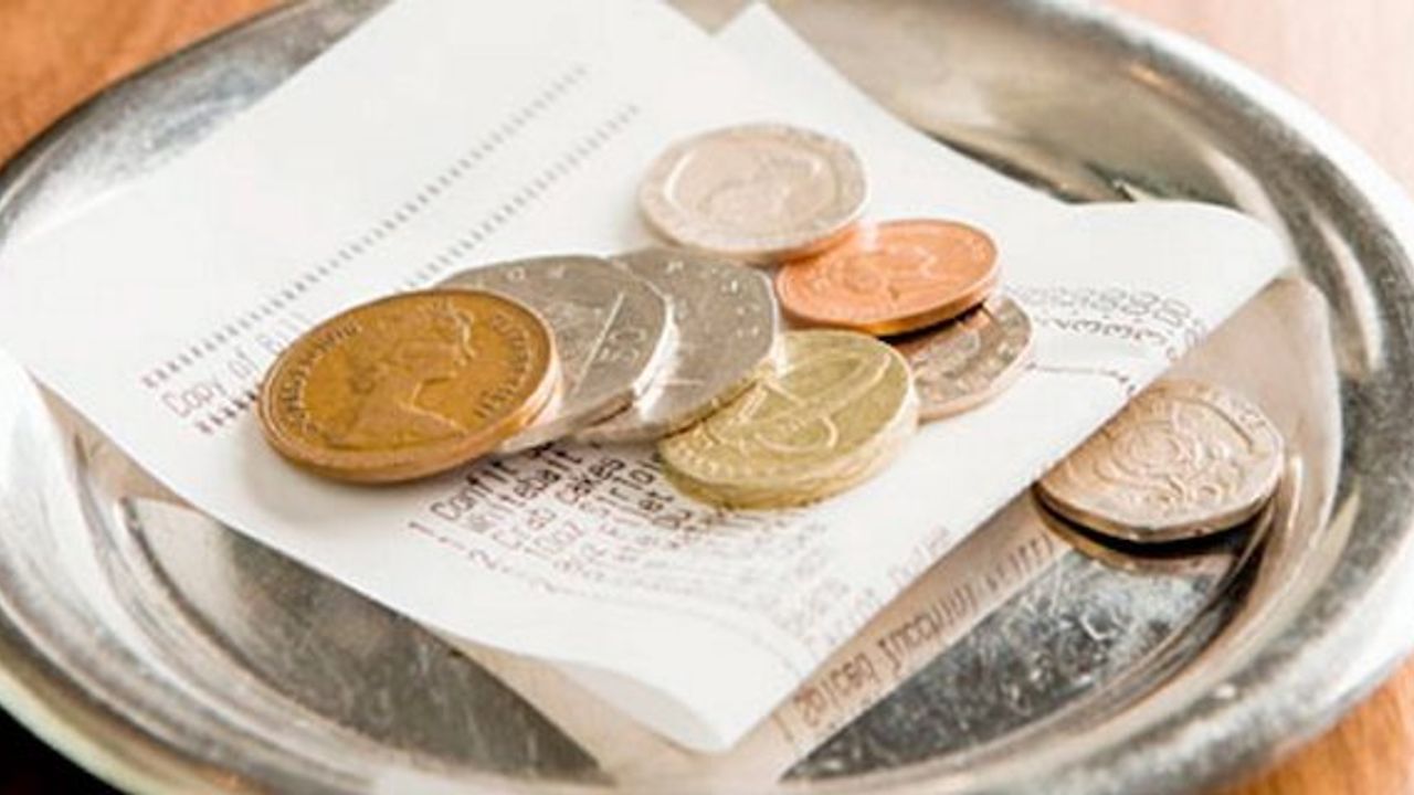 Restaurant and bar bosses will be banned from snatching workers’ tips, Theresa May announces