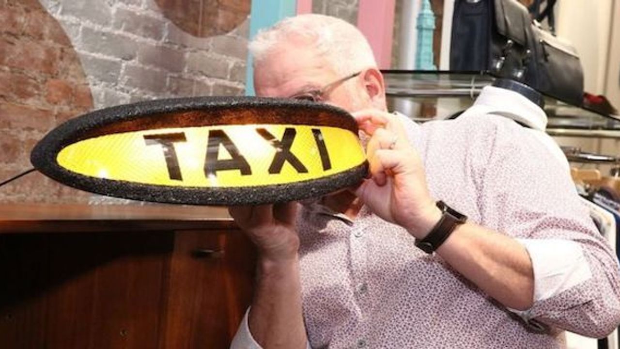 Ted Baker shares slide on hugging row