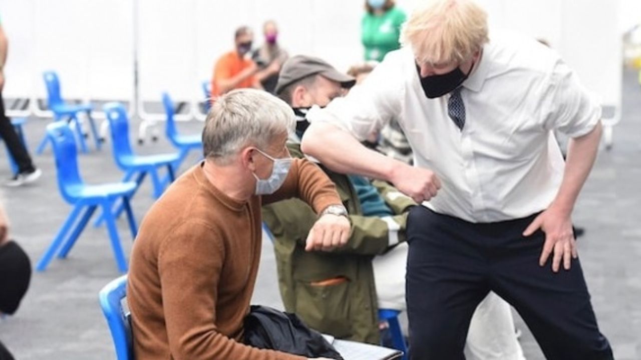 Britain's prime minister has urged people who received two COVID-19 jabs to take the booster jab