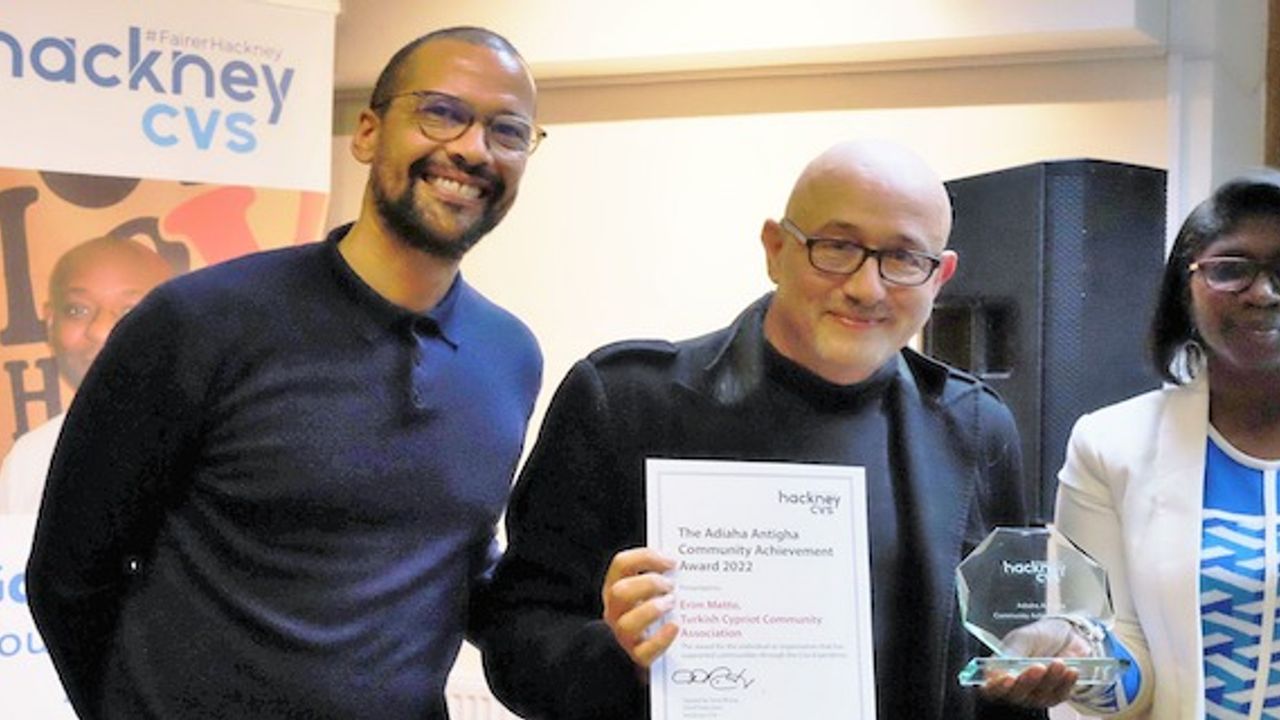 TCCA with its accolade of achievement being presented Erim Metto