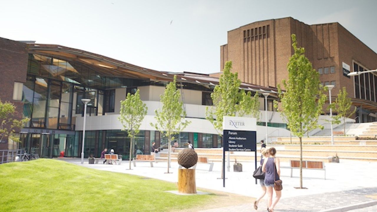 A man who raped an Exeter University student as she was asleep in bed has been jailed