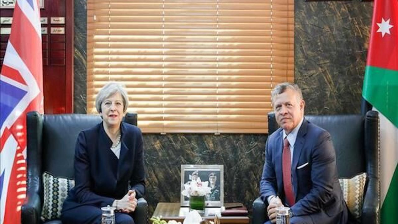 Minister Theresa arrives in Jordan, meets King Abdullah II